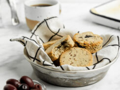 Grain Free & Vegan Almond Flour Biscuits in a serving bowl with a coffee on the side