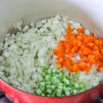 Add vegetables to a pot for Freezer-Friendly Lentil Soup