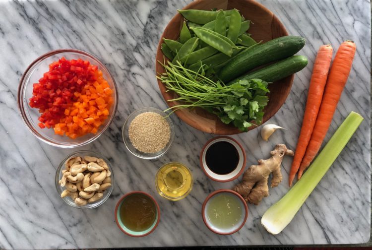 Bowls of the vegetables and sesame ginger dressing ingredients needed for the Asian Vegetable Salad