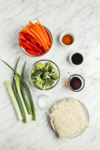 Vegetable ramen ingredients in dishes.