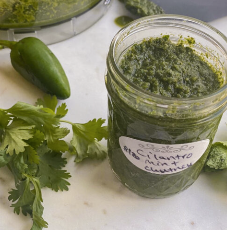 Here's your ingredient list for this GOOD sauce: jalapenos, mint leaves, cilantro leaves, lemon or lime juice, garlic, salt, and a little water.